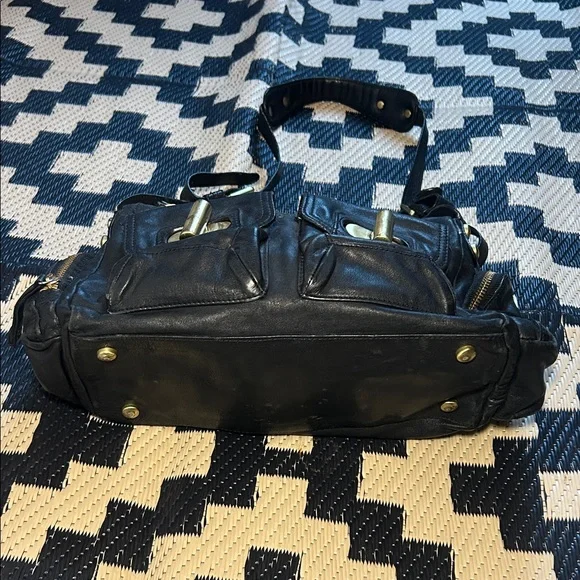 Kenneth Cole Black Leather Handbag with Gold Accents - Picture 2 of 4